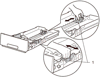 Adjust tray paper guides