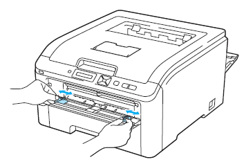 Slide the manual feed slot paper guides