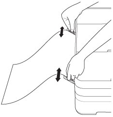 Adjust the manual feed slot paper guides