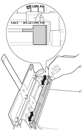 Slide the manual feed slot paper