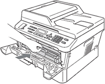 Put the new drum unit and toner cartridge assembly.