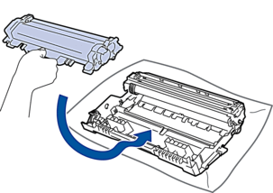 Push toner cartridge firmly into the new drum unit