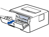 Remove toner cartridge and drum unit assembly from machine
