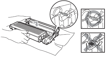 Put the toner cartridge back into the drum unit.