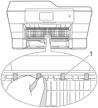 Clean the front side of the Paper Feed Rollers