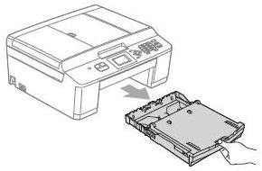 Pull the paper tray completely out of the machine.