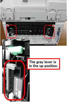 The two gray levers are in the up position.