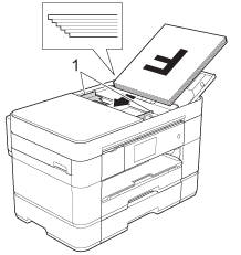 Adjust the paper guides