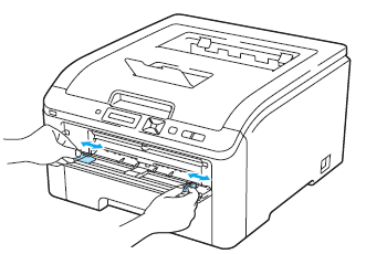 slide the manual feed slot paper guides