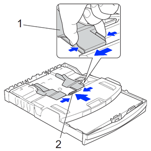 Slide paper guide to fit paper