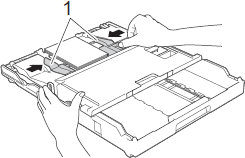 Adjust paper width guides to fit paper