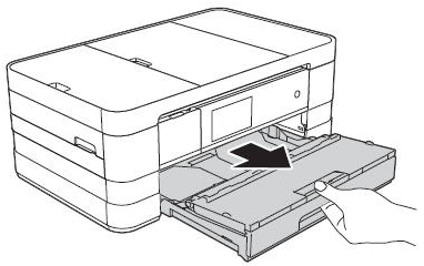 Pull the tray completely out of the machine