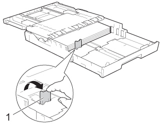 Open the output paper tray cover and lift the A4/LTR stopper