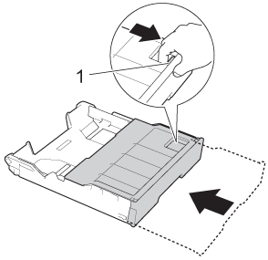 Shorten the tray by pressing the universal guide release button