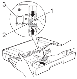 Press and slide the paper length guide to fit the paper size