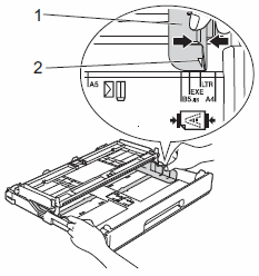 Press and slide the paper guides