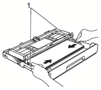 Gently adjust the paper guides