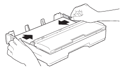 Réglez les guide-papier.