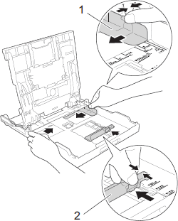 Adjust paper guides to fit paper size