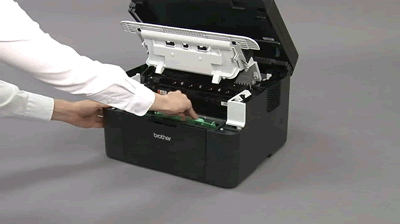 Install the toner cartridge and drum unit assembly in the machine.