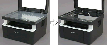 Open the scanner cover and remove the transparent sheet.