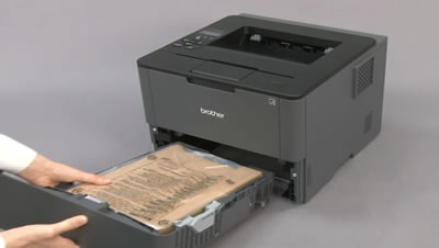 Pull the paper tray out of the machine.