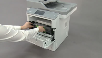 Install the drum unit and toner cartridge assembly back into the machine