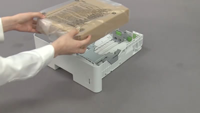 Remove the packing material from the paper tray