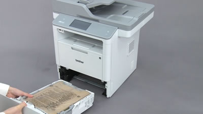 Pull the paper tray out of the machine
