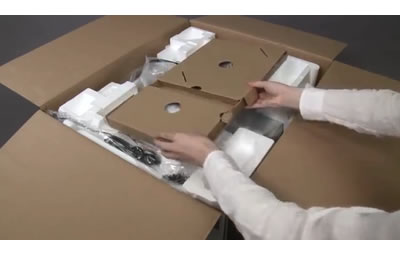 Remove the package containing printed materials and ink cartridges