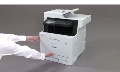 Push the paper tray completely into the machine