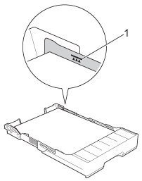 Make sure the paper is below the maximum paper mark