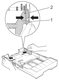 Slide the paper guides