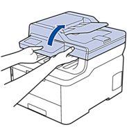 Use both hands to lift up the scanner cover