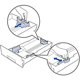 Slide the paper guides to fit the paper