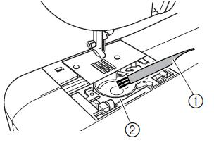 remove any dust from the shuttle race and its surrounding area