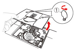 Remove the two screws, and then slide the needle plate.