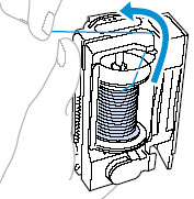 Pass the thread through the slit in the top of the thread cassette.