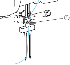 Pass the thread through the needle bar thread guides on the needle bar.